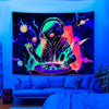 A vibrant tapestry featuring a stylized alien head with headphones against a dark, cosmic background.