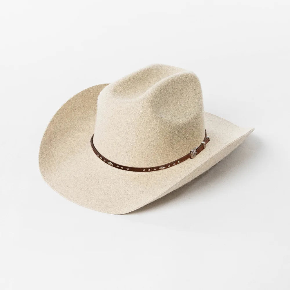 A beige wool cowboy hat with a brown studded leather band shown from above.