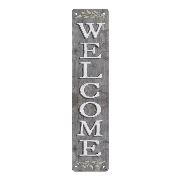Vertical rustic metal sign with the word WELCOME carved into it and decorated with laurel leaves