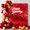 A red glitter wall backdrop decorated with balloons and a glowing Happy Birthday message.