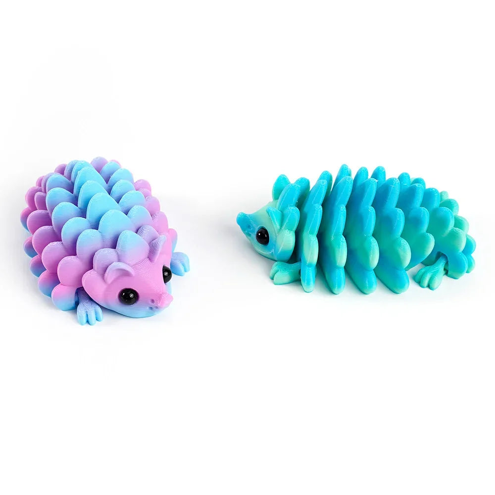 A pair of articulated 3D printed hedgehog figurines in shades of purple and blue.