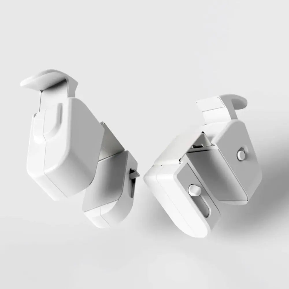A white Snap-On child safety door lock is shown from an angle against a light gray background.