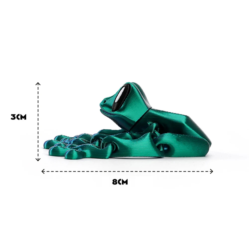 A teal green articulated 3D printed frog magnet used for desk or fridge decoration.