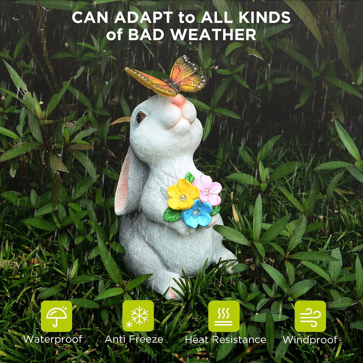A white rabbit garden statue with a butterfly, surrounded by green foliage and rain.