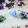 A collection of blue and teal floral PET stickers for journaling and scrapbooking on a translucent background.