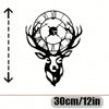 Black metal wall sculpture of a deer head with antlers and a circular clock face.
