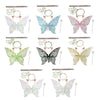 A set of sparkling fairy wings, including wings in various colors and a wand, crown, and floral elements.
