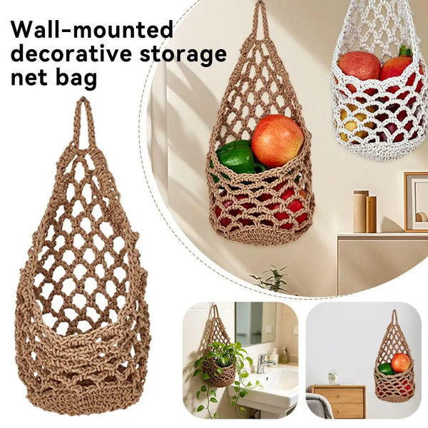 Wall-mounted macrame decorative storage net bag made of natural fiber holding fruits and vegetables