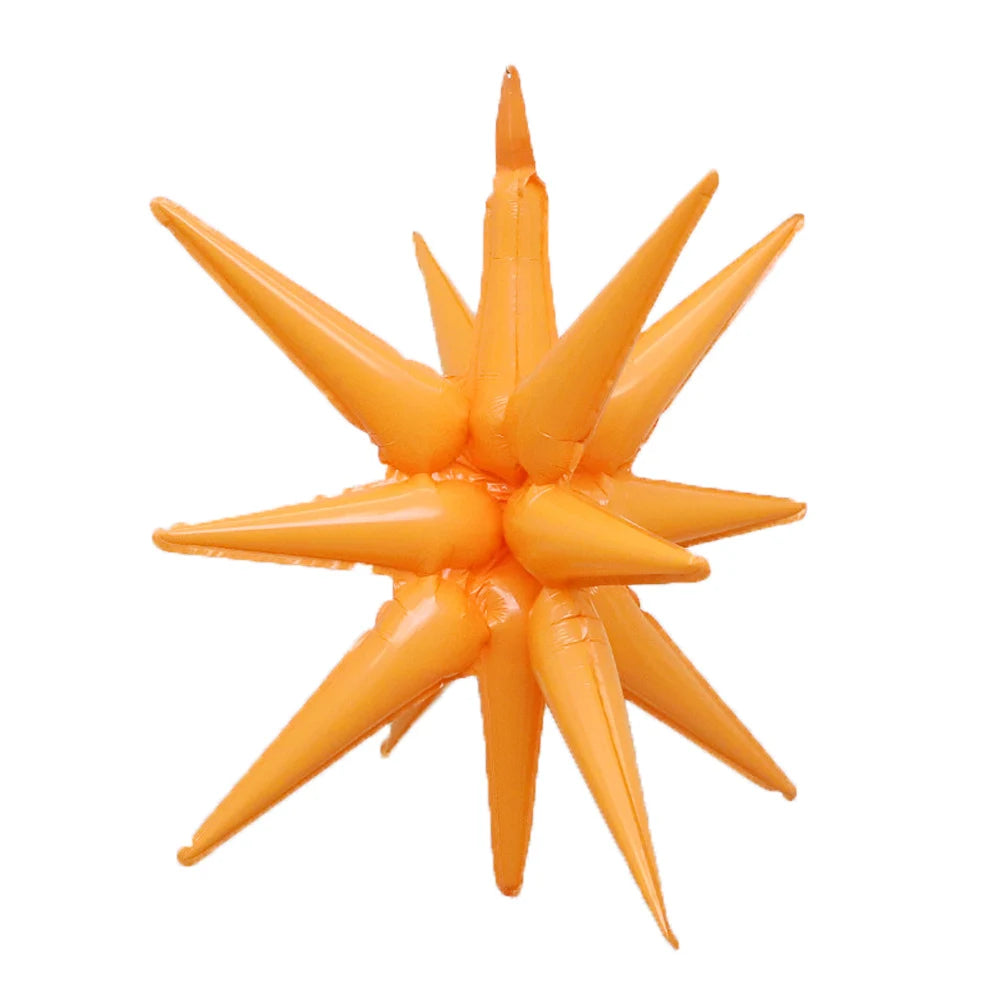 A cluster of orange star-shaped foil balloons for party decor