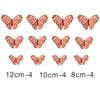 A set of eight orange and pink butterfly cake toppers in various sizes, measuring 8cm to 12cm.