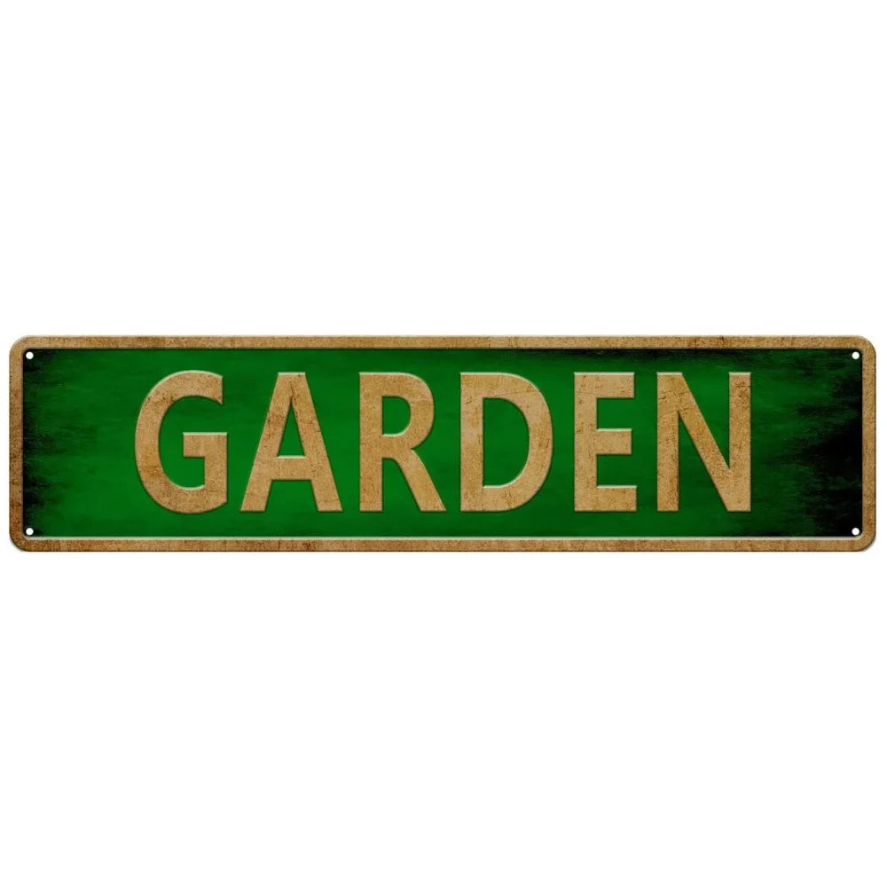 A rectangular green metal tin sign with the word GARDEN written in gold lettering.