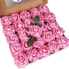 A box filled with pink artificial foam roses for weddings and home decor