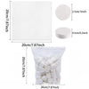 A package of white compressed camping towels, showing the individual towel size and the bulk quantity.