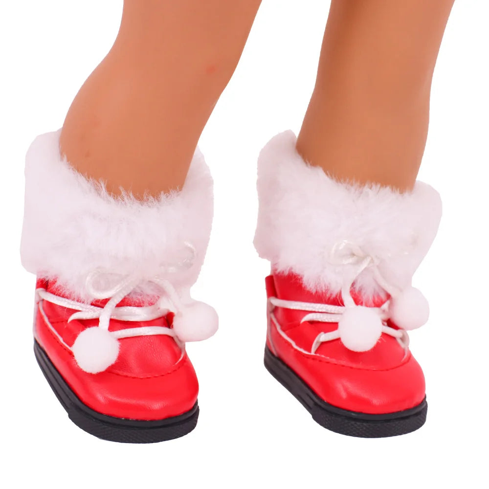 A pair of red boots with white faux fur trim and white laces for a Christmas doll outfit set.
