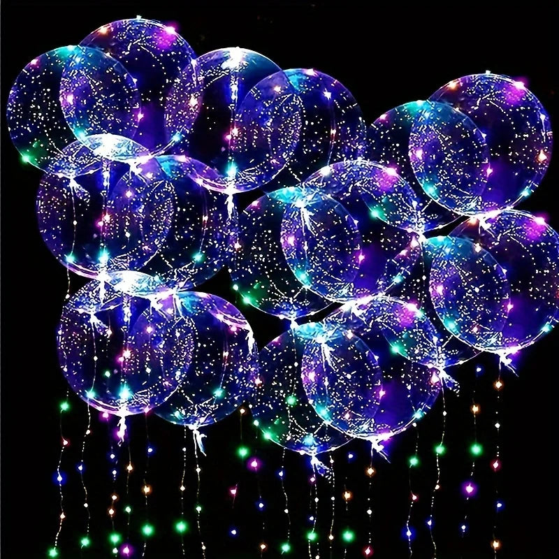 A cluster of glowing LED illuminated balloons in shades of purple and blue, sparkling with tiny lights.