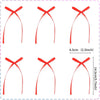 Red ribbon cake toppers in various sizes and shapes for birthday decorations