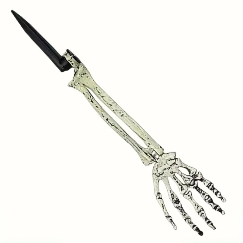 A Halloween skeleton bone garden stake featuring a skull and hand design.