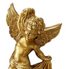 A golden cherub angel sculpture with feathered wings.