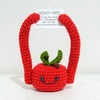 Handmade crochet apple doll in red with an inspirational card