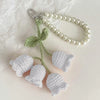 Handmade pearl chain orchid key ring with a light green crocheted flower attached