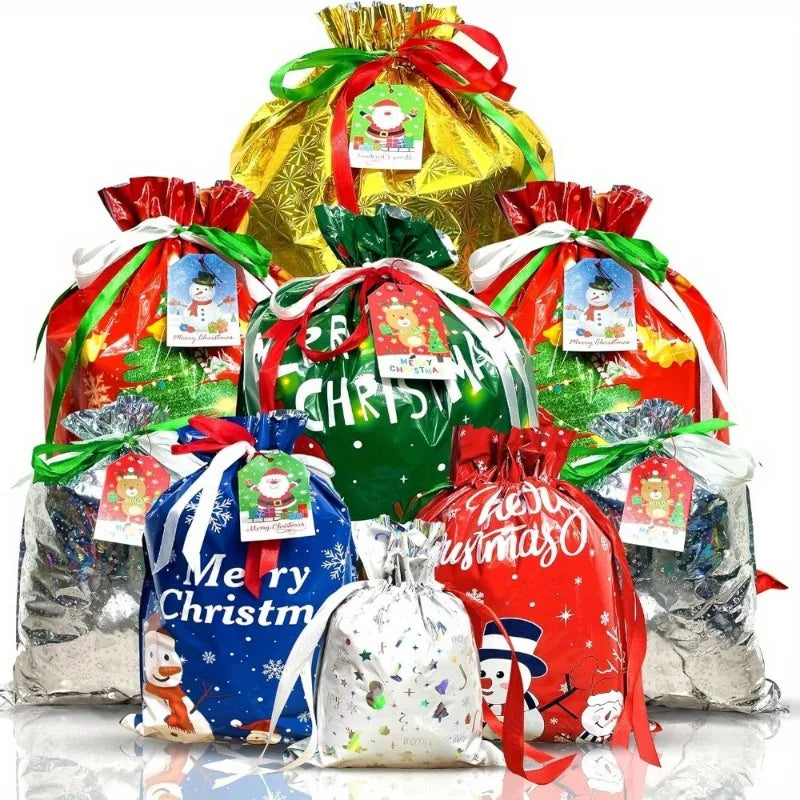 A set of three festive Christmas drawstring gift bags in red, green, and gold foil packaging.