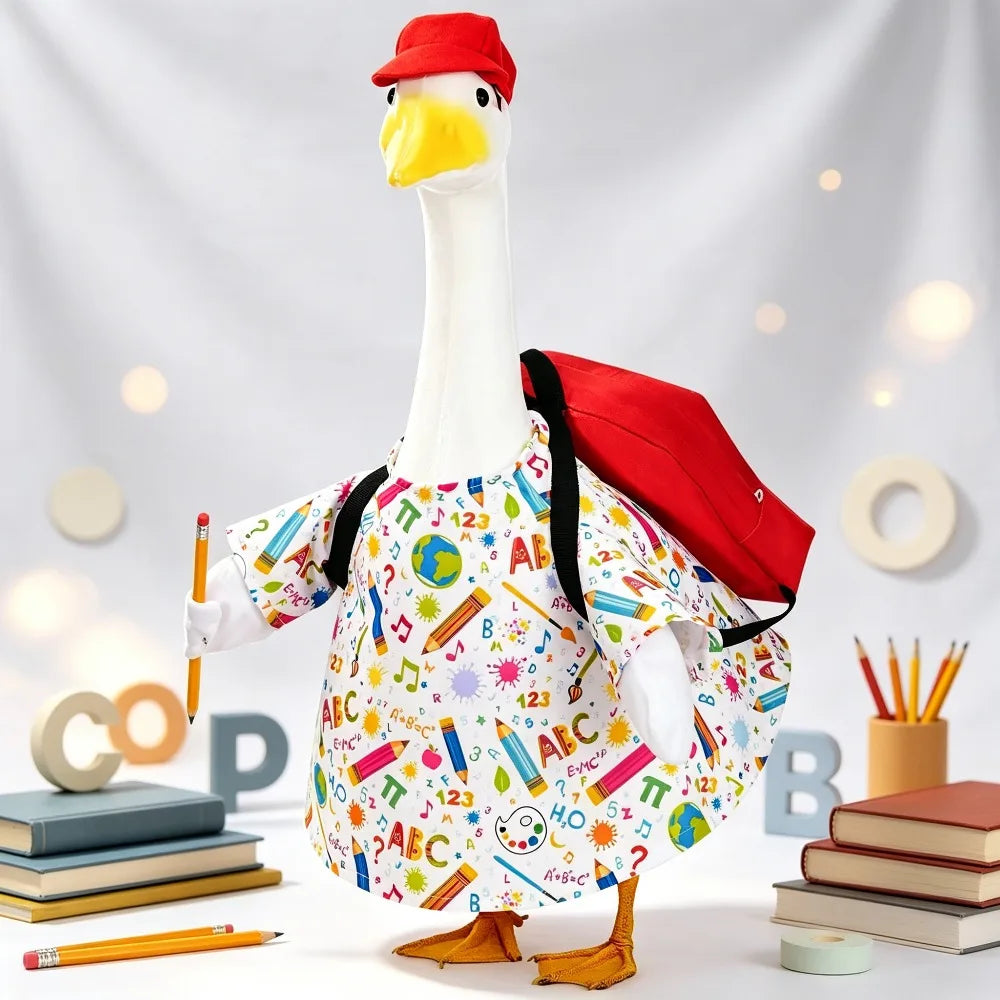 A white goose statue wearing a red cap and colorful patterned clothing stands on a white surface.