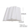 A stack of white lollipop sticks, measuring 5.9 inches long and 0.1 inches in diameter.