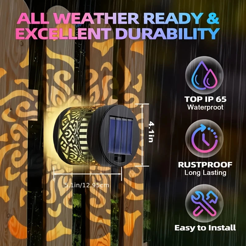 A black solar-powered mandala wall lantern installed on a wooden fence, highlighting its waterproof and durable features.