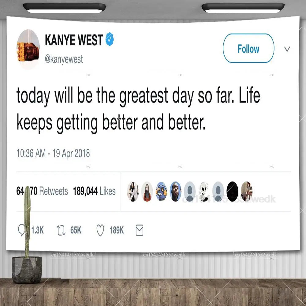A tapestry wall hanging featuring Kanye West's quote on a social media post.