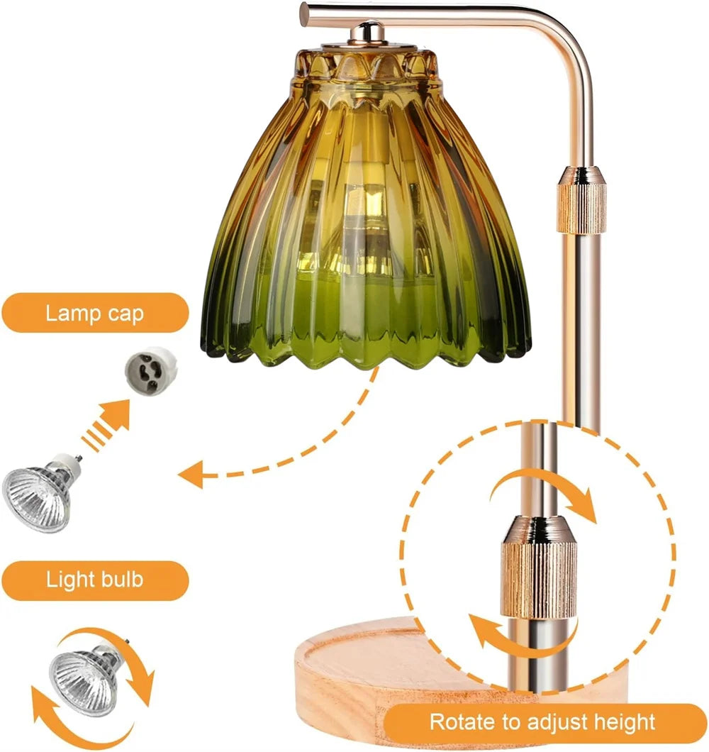 A brass adjustable lamp with a green glass shade and a light bulb, showing how to rotate to adjust height.