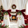 Festive Christmas curtain tie-backs with red bows and pinecones framing a fireplace