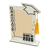 A white graduation photo frame with a black silhouette design and gold accents.