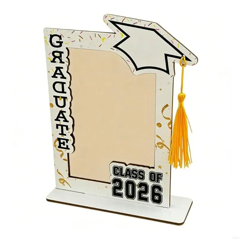 A white graduation photo frame with a black silhouette design and gold accents.