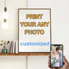 A framed print with the text PRINT YOUR ANY PHOTO customized displayed next to a smartphone showing a couple.