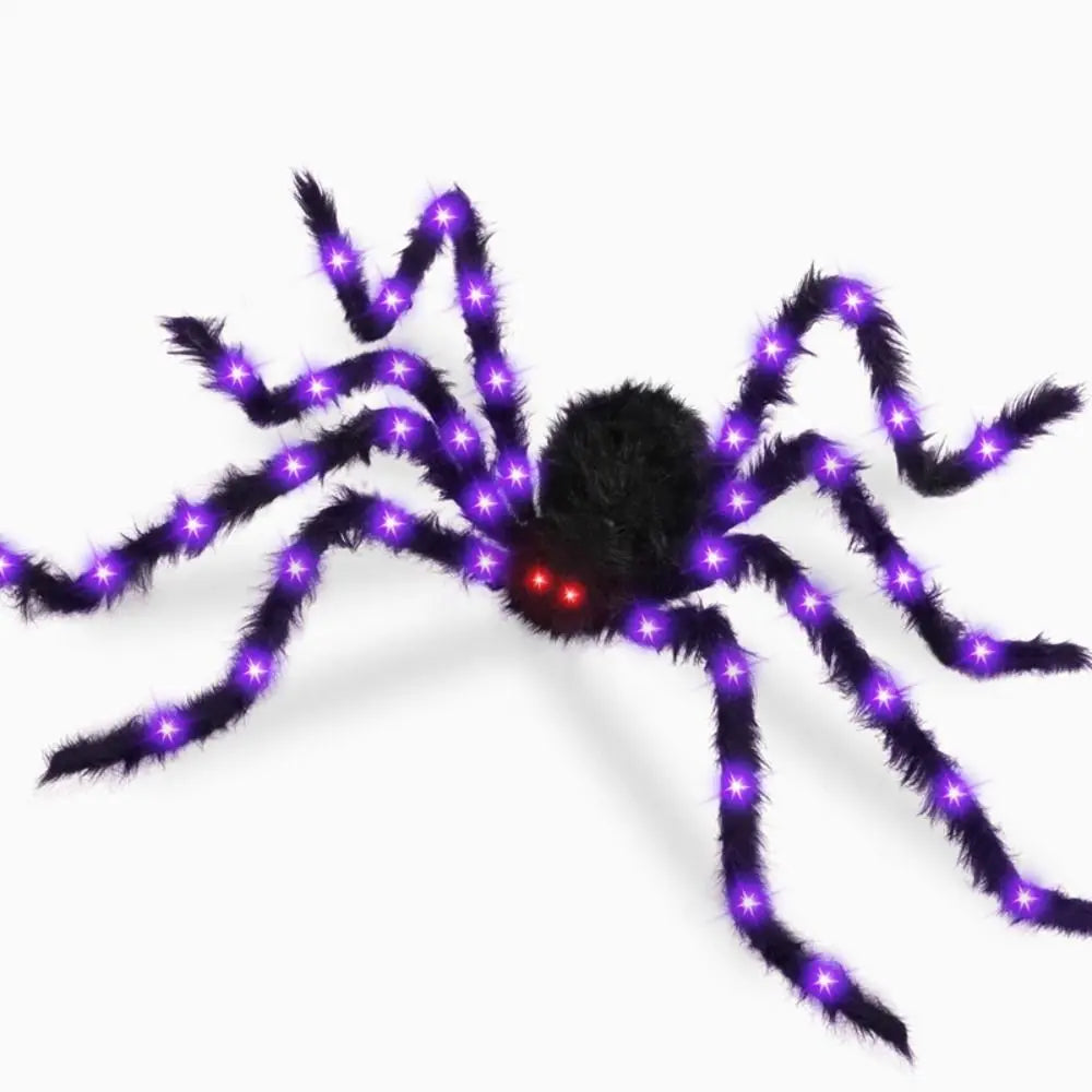 A black Halloween spider with glowing purple LED lights on its legs and body.