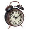 A vintage twin-bell alarm clock with a dark casing and wooden accents, showing the time.