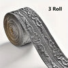 Roll of silver self-adhesive PE foam edge banding trim for walls, ceilings, and door frames