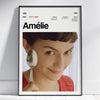 A framed portrait of a young woman named Amélie with a spoon in her hand.