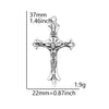 A silver crucifix cross charm with a detailed depiction of the crucifixion.