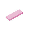 A single pink smooth tile building brick.