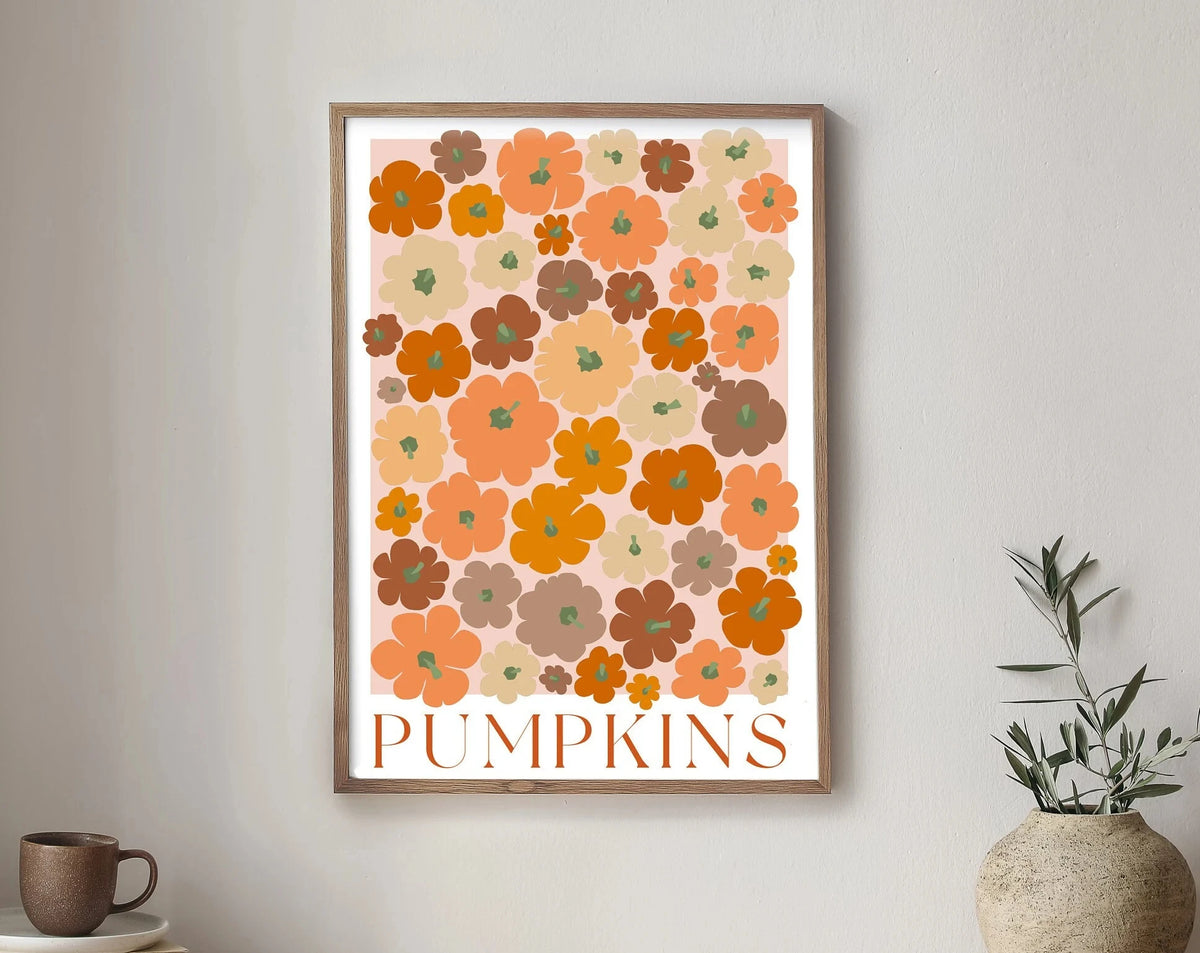 Wall art poster featuring a floral pattern of orange and brown pumpkins with the word PUMPKINS below.