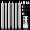 A set of white flameless LED taper candles and a remote control for timer and light functions.
