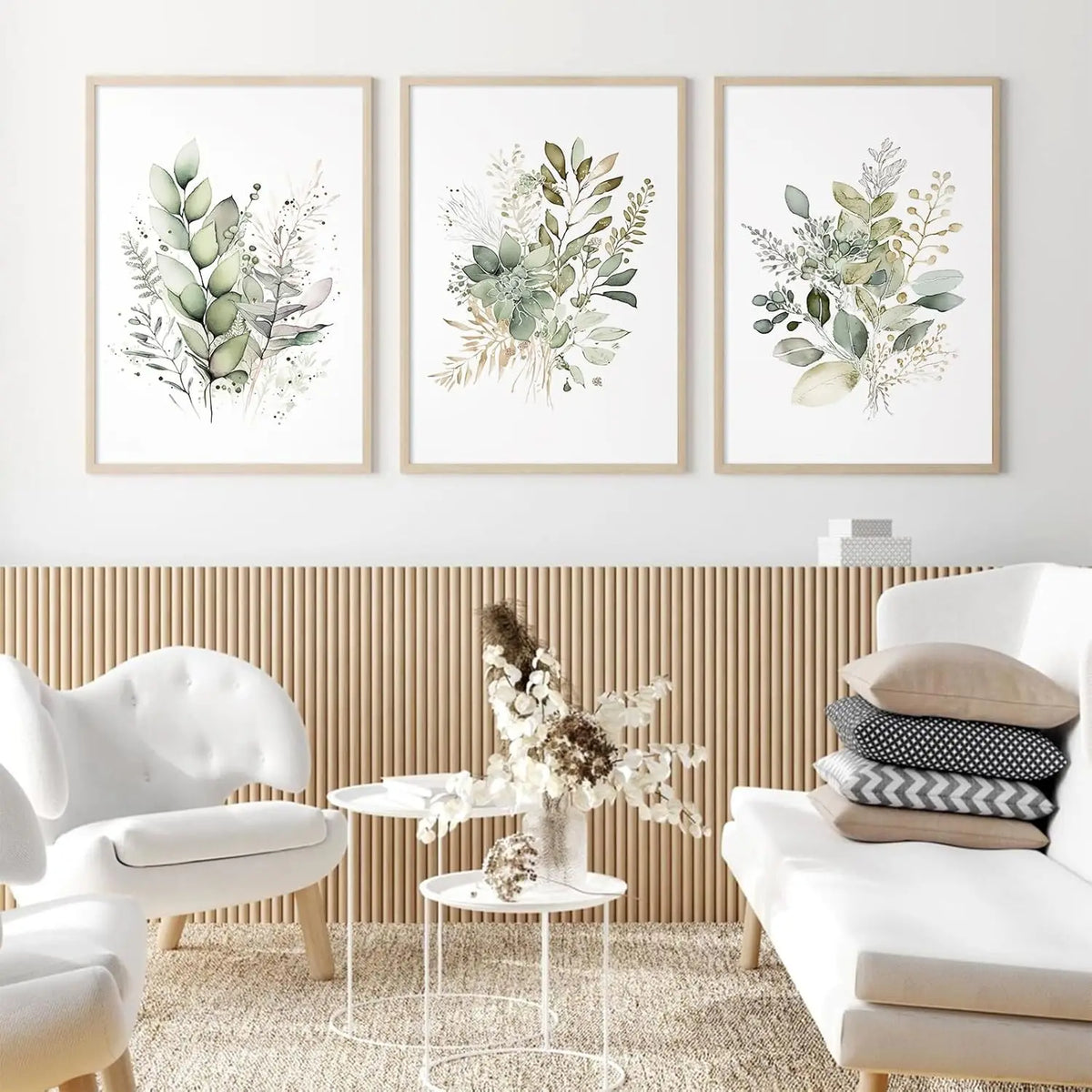 A set of three watercolor botanical prints featuring wild flowers and greenery on canvas wall art