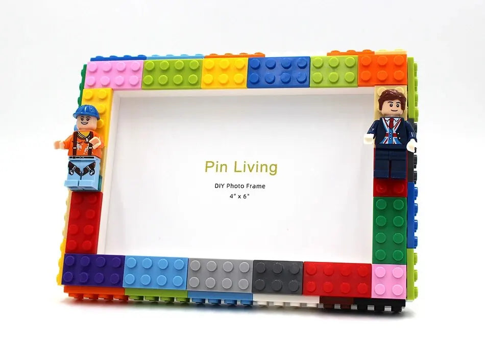 A colorful building block photo frame kit featuring a white frame and figures.