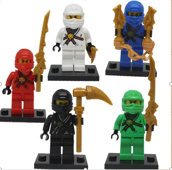 A collection of five Golden Ninja building block figures in various colors and poses.