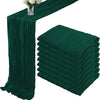 A set of dark emerald green terracotta semi-sheer cheesecloth table runners displayed on a table.
