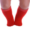 Pair of bright red knitted socks for dolls