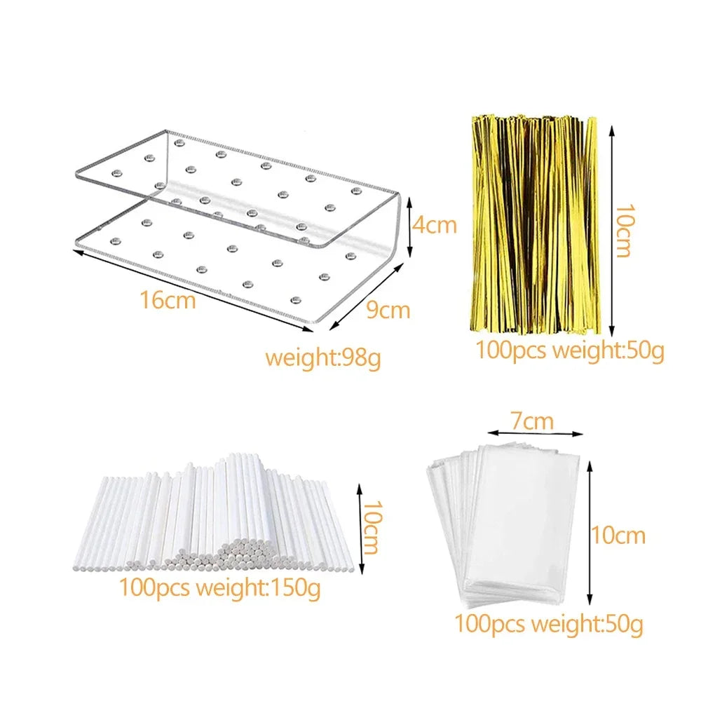 Display stand for cake lollipops featuring clear acrylic trays and white paper rolls.