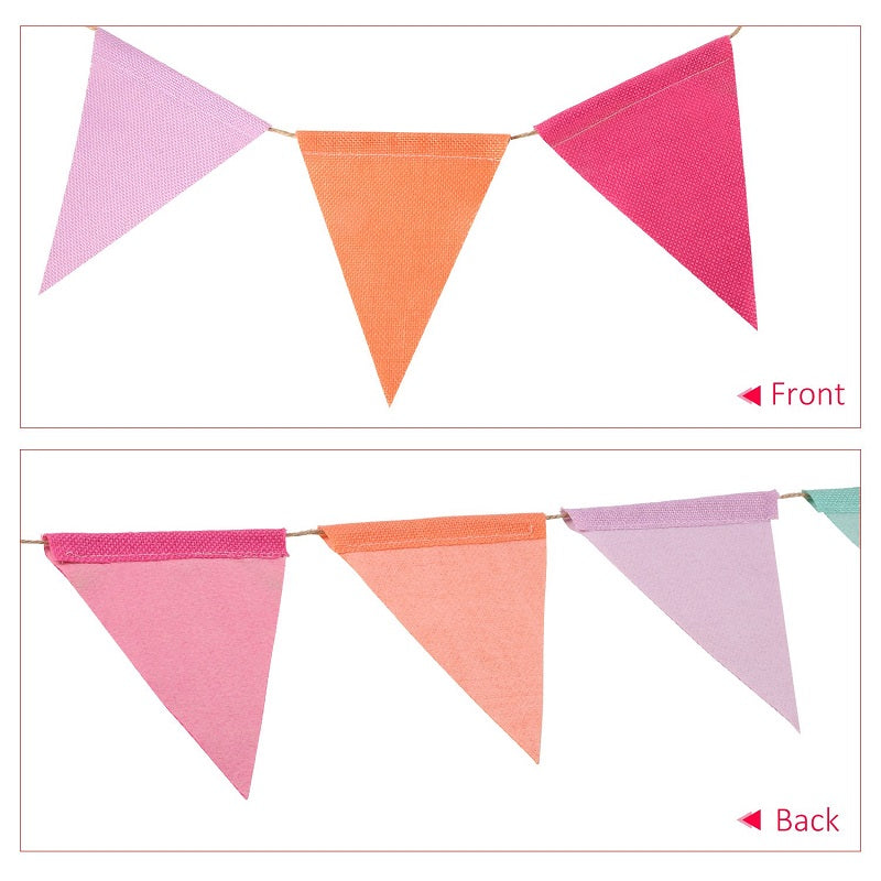 A set of colorful jute linen pennant banners in pink, orange, and purple arranged in a line.