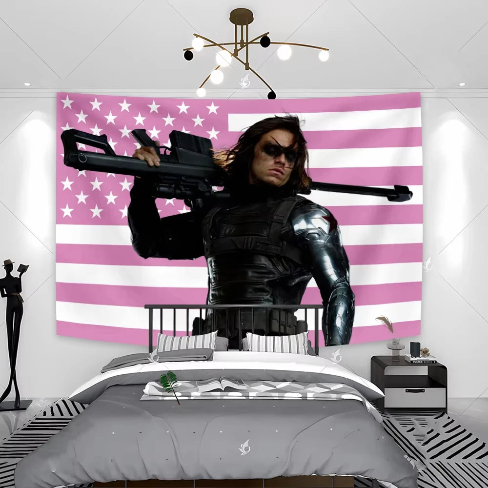 A pink American flag tapestry wall hanging displayed above a bed.